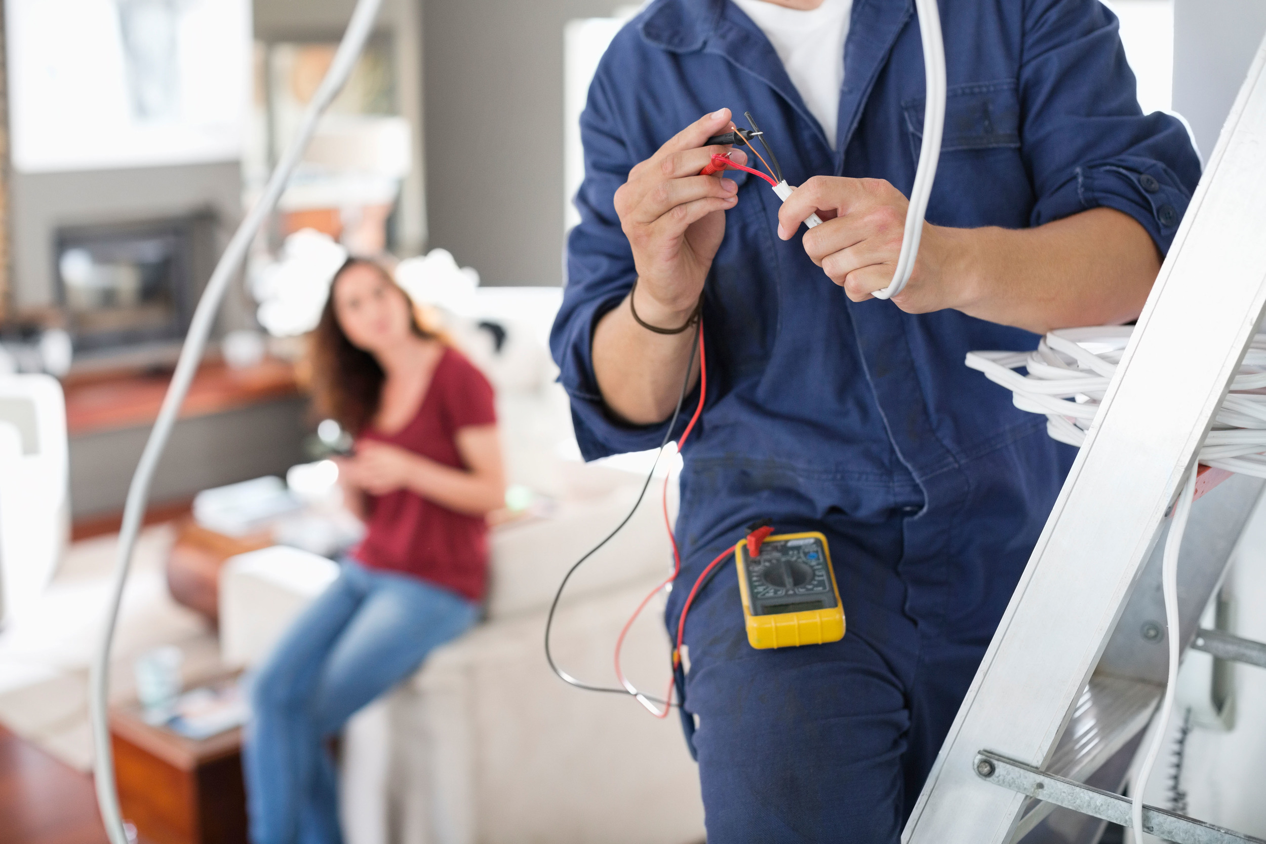 electrician-working-in-living-room-1